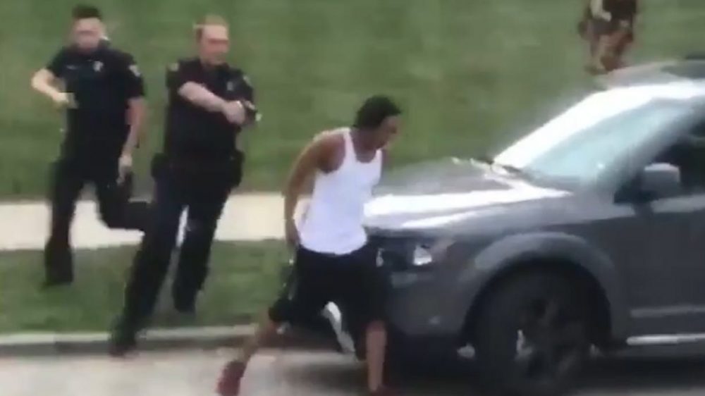 Video shows police shooting an unarmed black man in front of his kids
