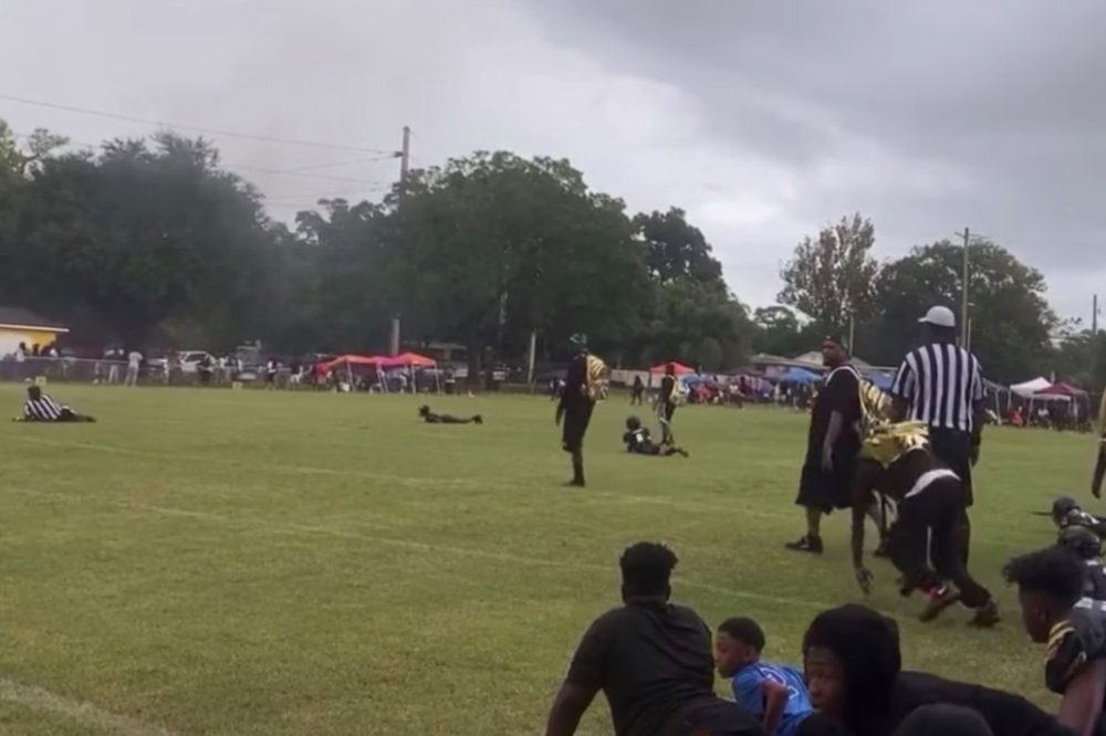 Shooting at youth football game leaves one man dead, son wounded