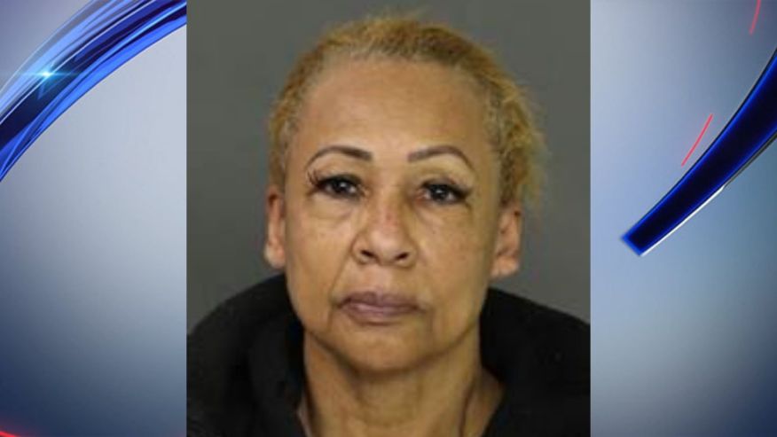 Woman arrested after foster child is found tied to fan; police