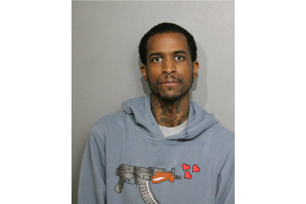 Rapper Lil Reese arrested on domestic violence charges weeks after being shot