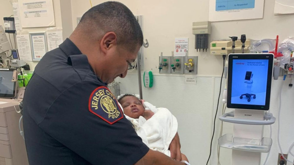 Police officer catches 1-month-old baby thrown over balcony